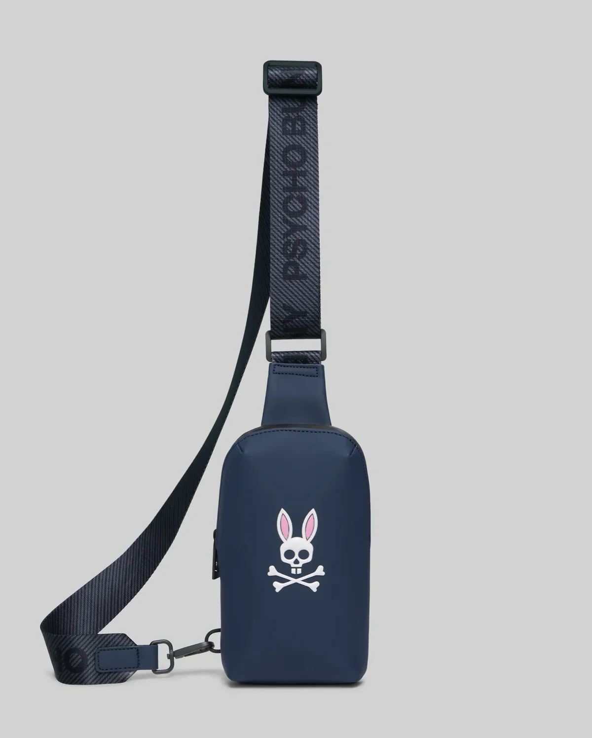 Bolso cruzado con acabado de goma