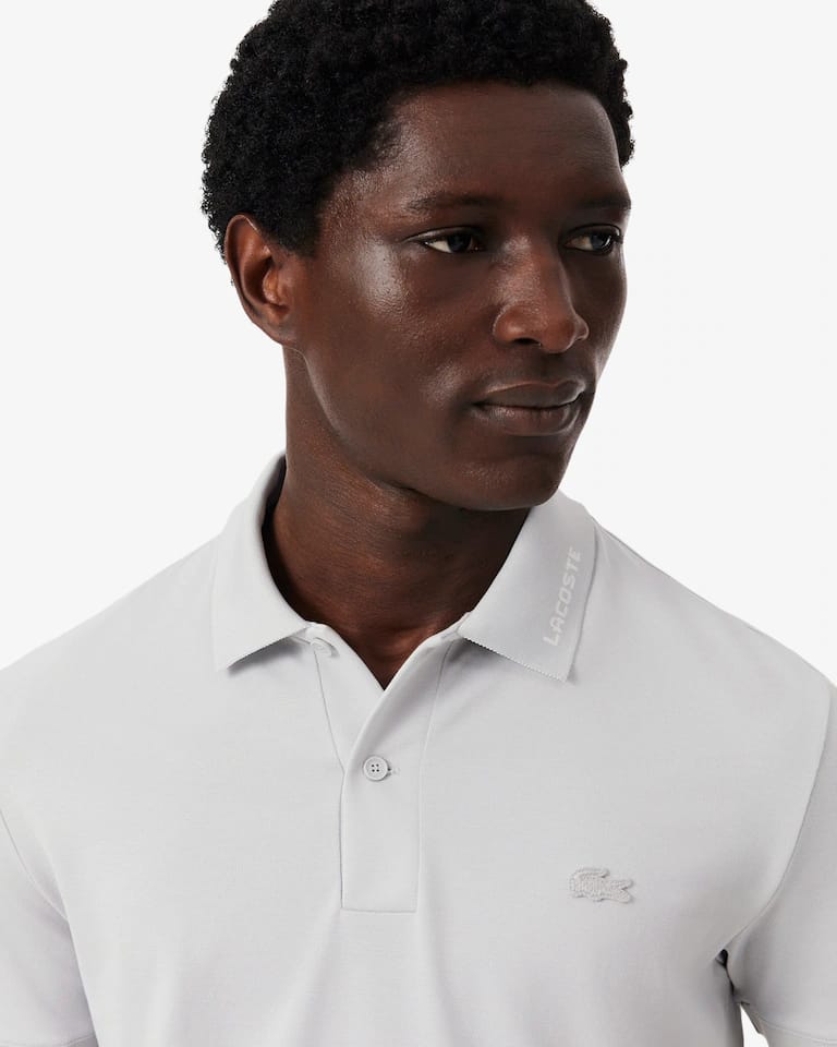 Polo Commuter de piqué de corte ajustado con detalles de marca de jacquard – foto 3