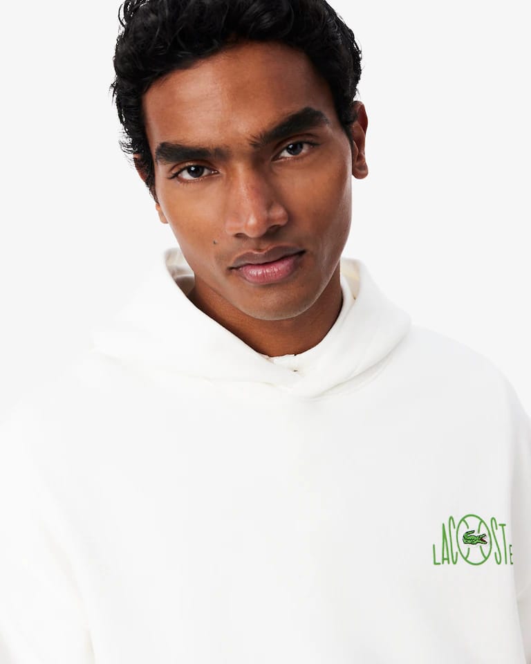 Sudadera con capucha con múltiples estampadas – foto 1